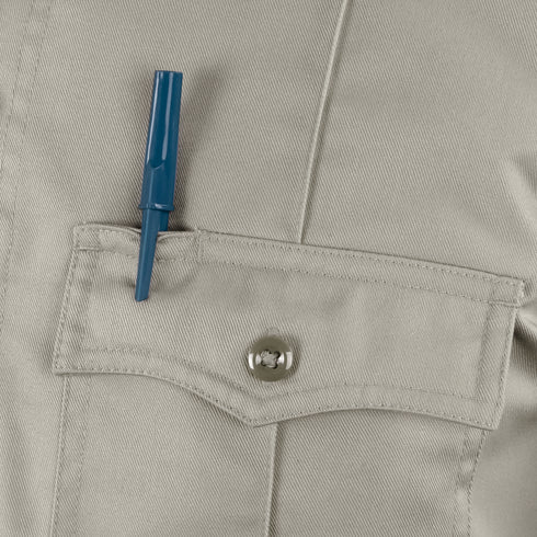 A blue pen clipped to the buttoned pocket of the beige Condor Womens Class B Uniform Shirt offers classic EDC convenience for military or law enforcement professionals.